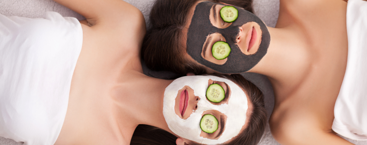 Two guests enjoying relaxing facial treatments